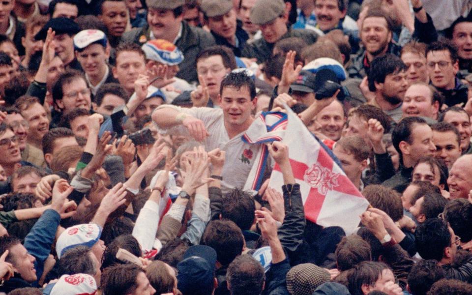 England captain Will Carling is chaired from the pitch after England had beaten France 21-19 to win the 5 Nations Championship and the Grand Slam at Twickenham on March 16, 1991 in London, England.