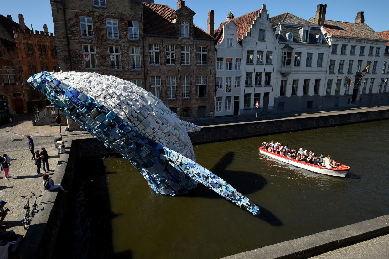 A 12-metre installation depicting a whale, made up of five tons of plastic waste pulled from the Pacific Ocean, in Bruges, Belgium (JOHN THYS/AFP via Getty Images)