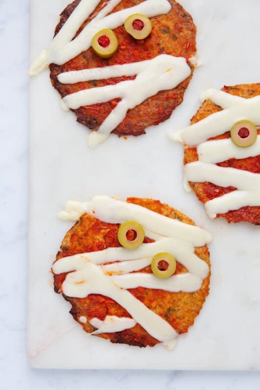 <p>Cali'flour Foods</p><p>Eating healthy might sound boring but not with these Cali'flour flatbreads! They make creating mini mummies with cheese and green olives a fun event!</p><p><strong>Get the recipe here: <a href="/1108712/kelli_acciardo/mini-mummy-pizzas-halloween-recipe/" data-ylk="slk:Mini Mummy Pizzas;elm:context_link;itc:0;sec:content-canvas" class="link rapid-noclick-resp">Mini Mummy Pizzas</a></strong></p><p><strong>Related: <a href="https://parade.com/846909/nettiemoore/31-creative-and-delicious-halloween-recipes/" rel="nofollow noopener" target="_blank" data-ylk="slk:33 Creative and Delicious Halloween Recipes;elm:context_link;itc:0;sec:content-canvas" class="link rapid-noclick-resp">33 Creative and Delicious Halloween Recipes</a></strong></p>