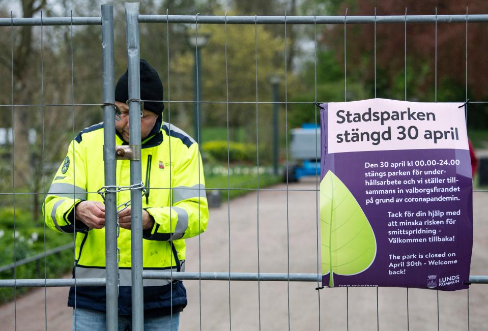 The City park (Stadsparken) is closed in Lund, Sweden, on April 30, 2020, amid the novel coronavirus COVID-19 pandemic. - Garden workers fertilized lawns with chicken manure in an attempt to aviod residents from gathering there for the traditional celebrations to mark Walpurgis Night. (Photo by Johan NILSSON / TT News Agency / AFP) / Sweden OUT (Photo by JOHAN NILSSON/TT News Agency/AFP via Getty Images)