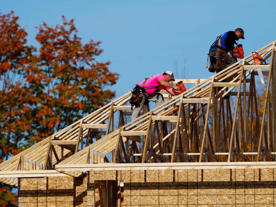 Carpenters work on a new home in a newly constructed subdivision in Ottawa on Wednesday, Oct. 20, 2021. (Sean Kilpatrick/The Canadian Press - image credit)