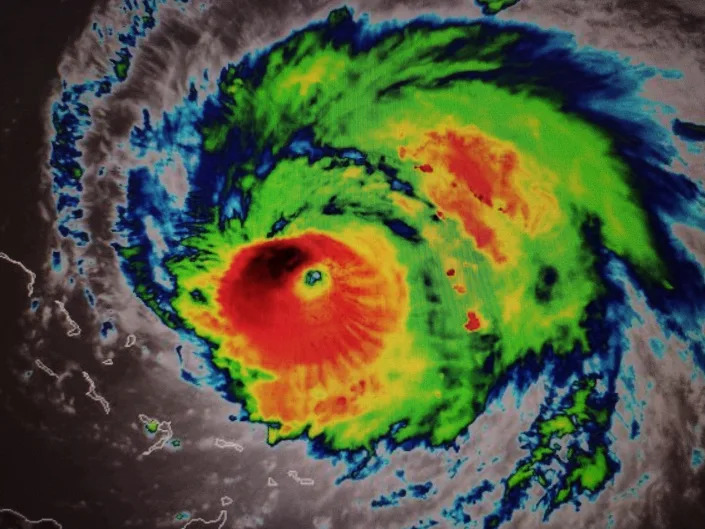Hurricane Fiona becomes a dangerous category 4 storm over the Atlantic south of Bermuda. This colorful infrared satellite image belies the power and strength of this tropical storm. The brighter tops show higher clouds with the black in the northwest quadrant being the coldest / highest. A well developed eye has formed with banded upper outflow depicted in this satellite imagery.