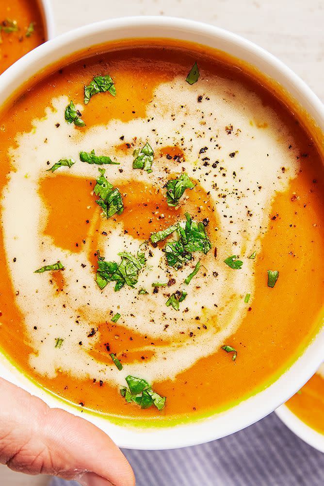 <p>Is there anything quite as satisfying when it's cold outside than a huge bowl of steaming soup, served alongside a buttered crusty roll? And this butternut squash and sweet potato version is SO healthy, and incredibly easy to make. </p><p>Get the <a href="https://www.delish.com/uk/cooking/recipes/a29841144/butternut-squash-sweet-potato-soup/" rel="nofollow noopener" target="_blank" data-ylk="slk:Butternut Squash And Sweet Potato Soup;elm:context_link;itc:0;sec:content-canvas" class="link ">Butternut Squash And Sweet Potato Soup</a> recipe.</p>