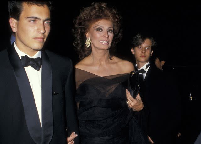 <p>Ron Galella/Ron Galella Collection via Getty</p> Carlo Ponti Jr. and mom Sophia Loren at the world premiere of "The Fortunate Pilgrim" in 1988