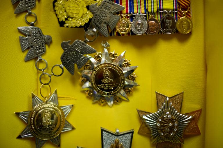 Medals worn by self-styled royal Raja Noor Jan Shah Raja Tuah Shah at his palace in Gombak, Malaysia, on September 7, 2013