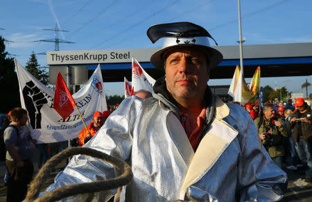 Thyssenkrupp steel workers hold a protest rally in Bochum, Germany, September 22, 2017 against the planned combination of the group's European steel operations with those of Tata Steel . REUTERS/Wolfgang Rattay