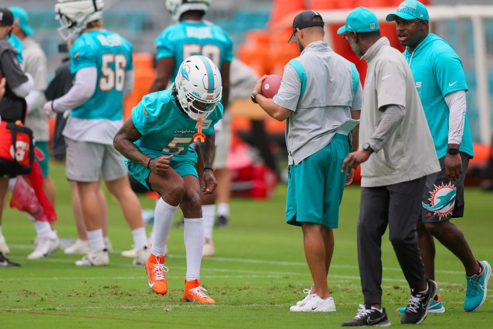 Miami Dolphins cornerback Jalen Ramsey (5) works out during training camp on July 26, 2023.