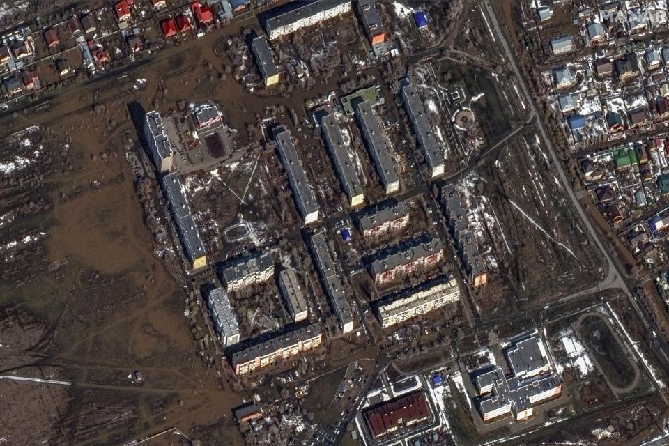This image provided by Maxar Technologies, shows flooded areas in Orenburg, Russia, Wednesday, April 3, 2024. State media say Russia's government has declared the situation in flood-hit areas in the Orenburg region a federal emergency. (Satellite image ©2024 Maxar Technologies via AP)