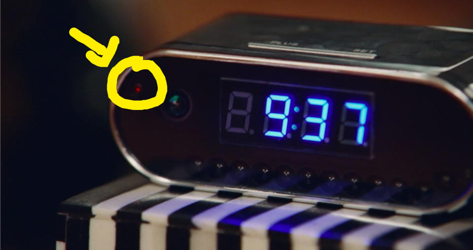 A closeup of a digital clock that's also records video