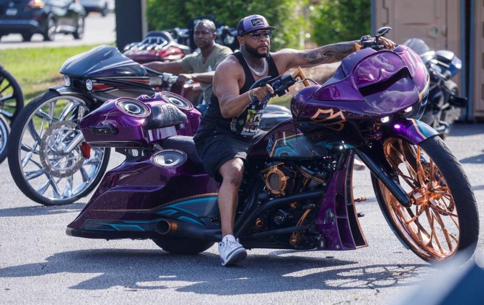 Chris Coleman of Albany, New York shows off his custom Harley-Davidson creation outside Hooters at the Myrtle Beach Mall on Friday.  The 2024 Black Pearl Cultural Heritage and Bike Festival, also known as Black Bike Week, came roaring to the north end of the Grand Strand on Friday evening.  Motorcyclists gathered at the Myrtle Beach Mall to show off their rides, rode through Atlantic Beach and partied beneath beach houses in North Myrtle Beach.  SC May 24, 2024.