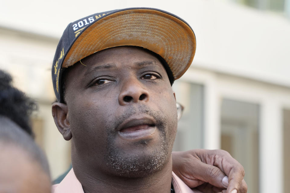 Eddie Terrell Parker speaks outside the federal courthouse in Jackson, Miss., Tuesday, March 19, 2024. A former Mississippi sheriff’s deputy was sentenced to about 20 years in prison for his part in torturing Parker and Michael Corey Jenkins in a racist assault last year and for his role in a separate episode where a white man was sexually assaulted. (AP Photo/Rogelio V. Solis)