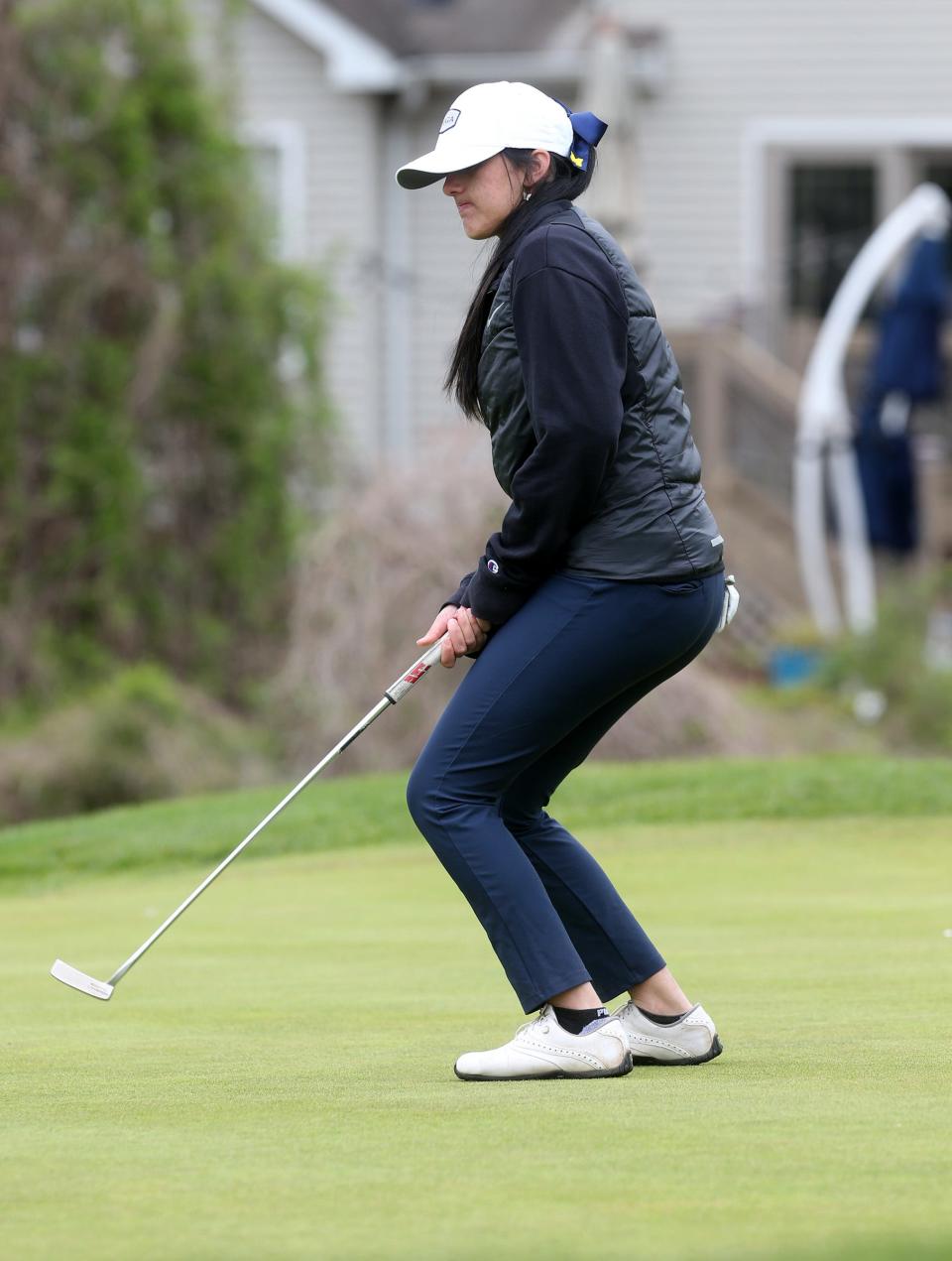 Marlboro's Kashish Malik reacts to a missed putt on the 14th green during the Shore Conference Tournament girls' golf tournament at Jumping Brook in Neptune Township Monday, April 25, 2022.  