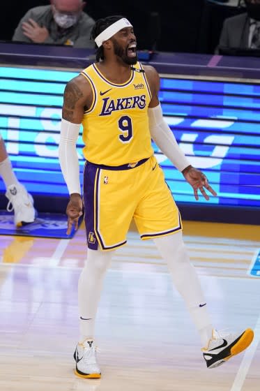 The Lakers' Wesley Matthews celebrates after making a three-pointer against the Phoenix Suns on May 27, 2021.