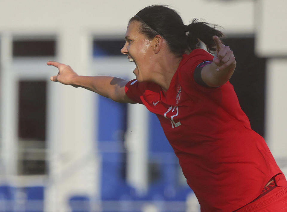 Canada's Christine Sinclair celebrates after scoring against St. Kitts and Nevis in a CONCACAF Olympic qualifying match Wednesday, Jan. 29, 2020, in Edinburg, Texas. Sinclair broke Abby Wambach's record of 184 goals. (Joel Martinez/The Monitor via AP)