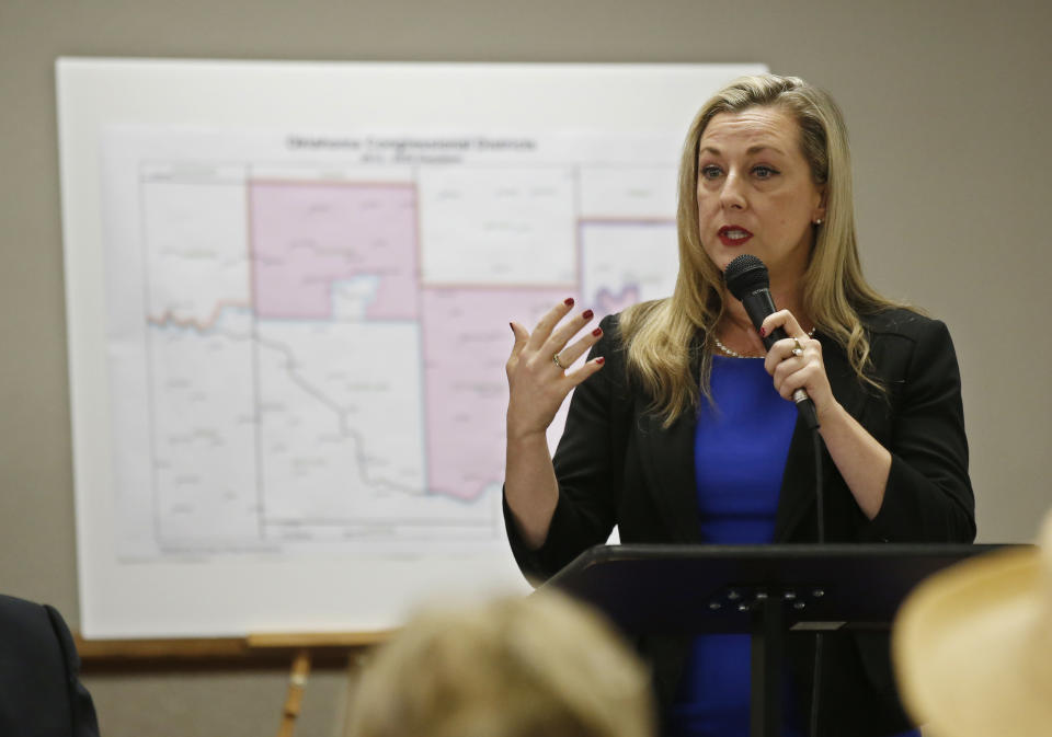 FILE - In this May 10, 2018 file photo, Kendra Horn speaks during a forum for Oklahoma 5th congressional district seat Democratic candidates for the group Edmond Democratic Women in Edmond, Okla. Horn couldn’t break the 50 percent barrier with six candidates in the Democratic primary and faces retired college professor and perennial candidate Tom Guild in the runoff on Tuesday, Aug. 28. They are vying to replace Republican U.S. Rep. Steve Russell, who is seeking a third term. (AP Photo/Sue Ogrocki, File)