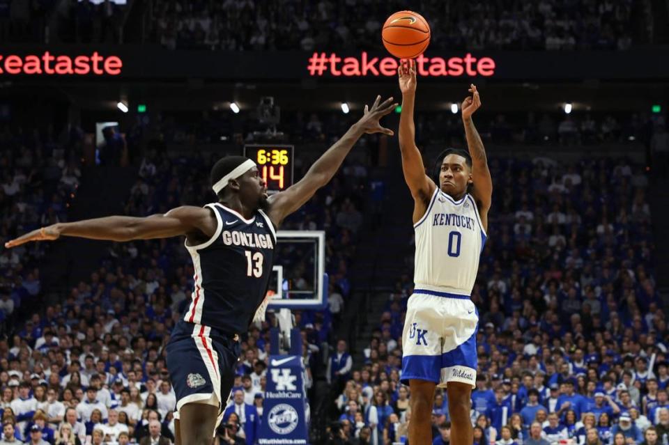 Kentucky’s Rob Dillingham (0) shoots over Gonzaga’s Graham Ike (13) during Saturday’s game at Rupp Arena. Dillingham finished with six points, two rebounds, three assists and one steal. Ike led the Bulldogs with 23 points.