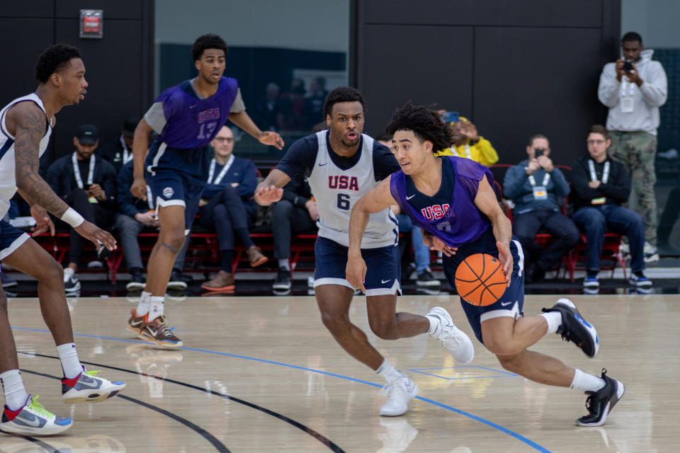 Bronny James guards Jared McCain at the Nike Hoop Summit.