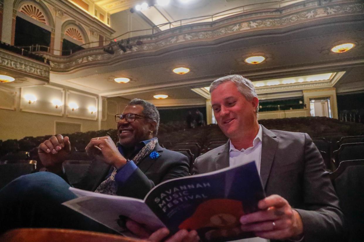 Savannah Music Festival Executive Director Gene Dobbs Bradford and Savannah Music Festival Artistic Director Ryan McMaken sit in the Lucas Theatre as they look through the lineup for the upcoming Savannah Music Festival;.