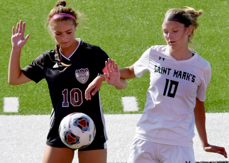 Maddie Schepers of Saint Mark's (right) works against Olivia Csapo of Caravel during the championship game of the DIAA Division II Girls Soccer Tournament on June 3. Schepers has been voted Delaware's Player of the Year by the state's coaches association.