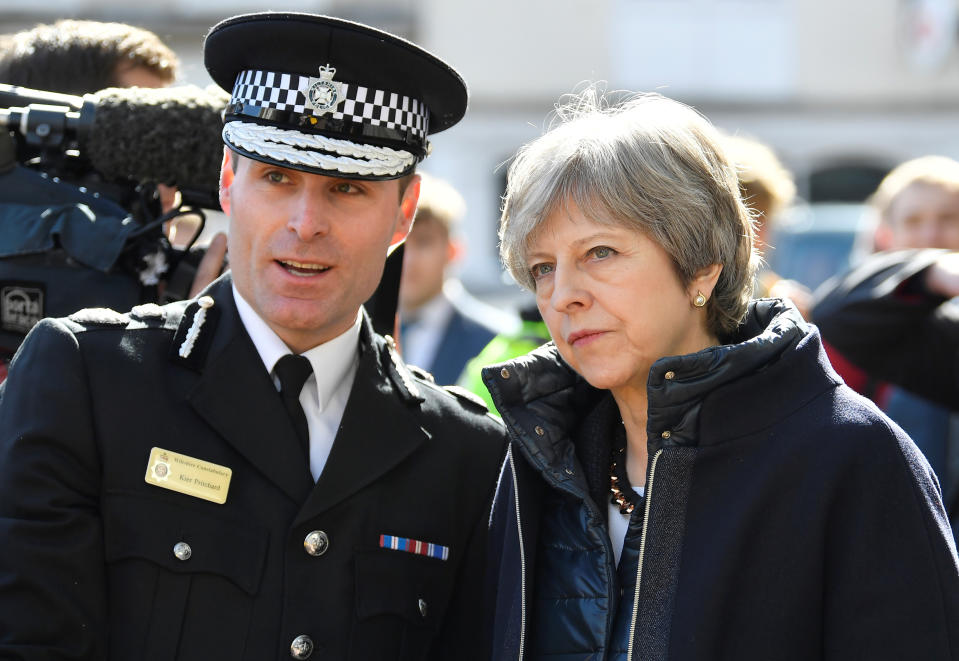 U.K. Prime Minister Theresa May visits Salisbury on March 15, where former Russian intelligence officer Sergei Skripal and his daughter, Yulia, were poisoned. (Toby Melville/Pool/Reuters)