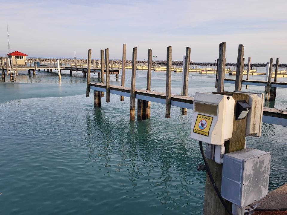 Empty slips lay in wait during the offseason at the Lexington harbor on Wednesday, Feb. 8, 2023. The harbor is receiving millions in state-back grant funds for improvements around the village's waterfront.