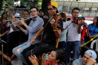 <p>Young musicians play music during a gathering against Venezuela’s President Nicolas Maduro’s government in Caracas, Venezuela June 4, 2017. (Photo: Marco Bello/Reuters) </p>
