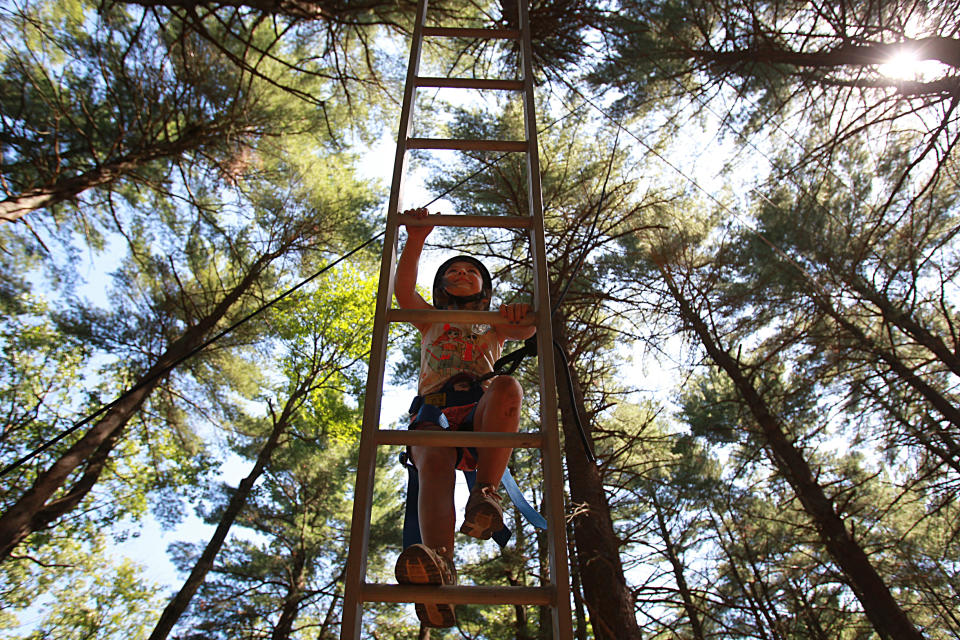 CANTON, MA - JULY 21: Elizabeth Curran, 6, at Ponkapoag Camp, a YMCA camp, in Canton, Mass., on July 21, 2016. Each summer, the YMCA partners with the Boston Police Department to identify children most in need of a few weeks at camp to help create positive relationships between at-risk children and the police.  (Photo by Suzanne Kreiter/The Boston Globe via Getty Images)