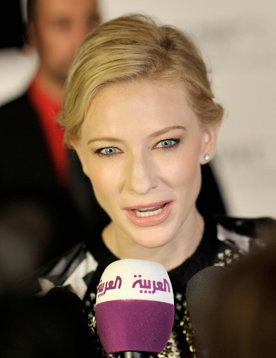 DUBAI, UNITED ARAB EMIRATES - DECEMBER 10: Actress Cate Blanchett speaks to the media as she attends the Dubai International Film Festival and IWC Schaffhausen Filmmaker Award Gala Dinner and Ceremony at the One and Only Mirage Hotel on December 10, 2012 in Dubai, United Arab Emirates. (Photo by Gareth Cattermole/Getty Images for DIFF)