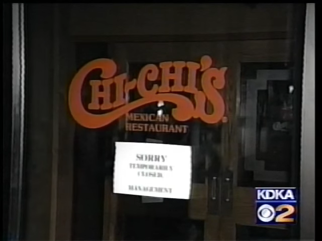 "Chi-Chi's Mexican Restaurant entrance with a 'Sorry Temporarily Closed' sign on the door."