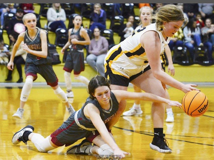 Barnsdall High's Sophia Gallagher, left, fights for a loose ball during Copan tourney girls basketball play on Dec. 10, 2022, at the Copan tourney.