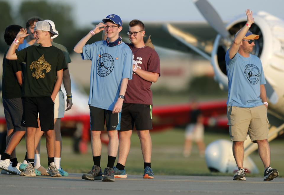 Scouts from Troop 12 and Troop 73 are introduced to spectators at EAA AirVenture Oshkosh 2022 on July 30  in Oshkosh, Wis.