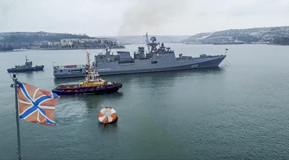 FILE - In this image from video released by the Russian Defense Ministry Press Service on Wednesday, Jan. 26, 2022, the Russian navy's frigate Admiral Essen prepares to sail off for an exercise in the Black Sea. A buildup of an estimated 100,000 Russian troops near Ukraine has fueled Western fears of an invasion, but Moscow has denied having plans to launch an attack while demanding security guarantees from the the U.S. and its allies. (Russian Defense Ministry Press Service via AP, File)