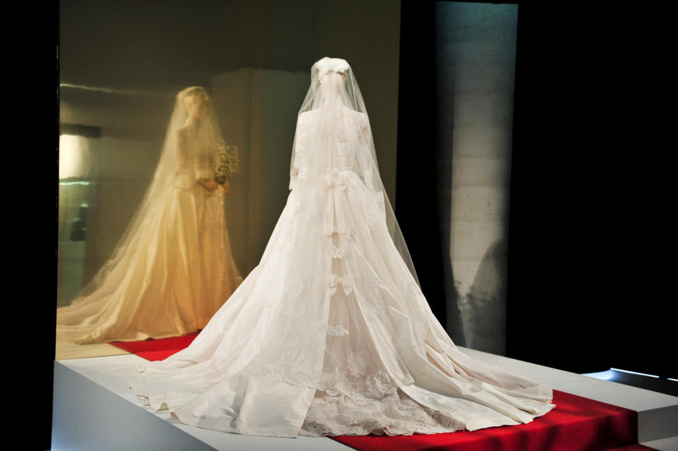 TORONTO, ON - NOVEMBER 01: Grace Kelly's wedding dress on display at Grace Kelly: From Movie Star to Princess exhibition media preview at TIFF Bell Lightbox on November 1, 2011 in Toronto, Canada.  (Photo by George Pimentel/WireImage)