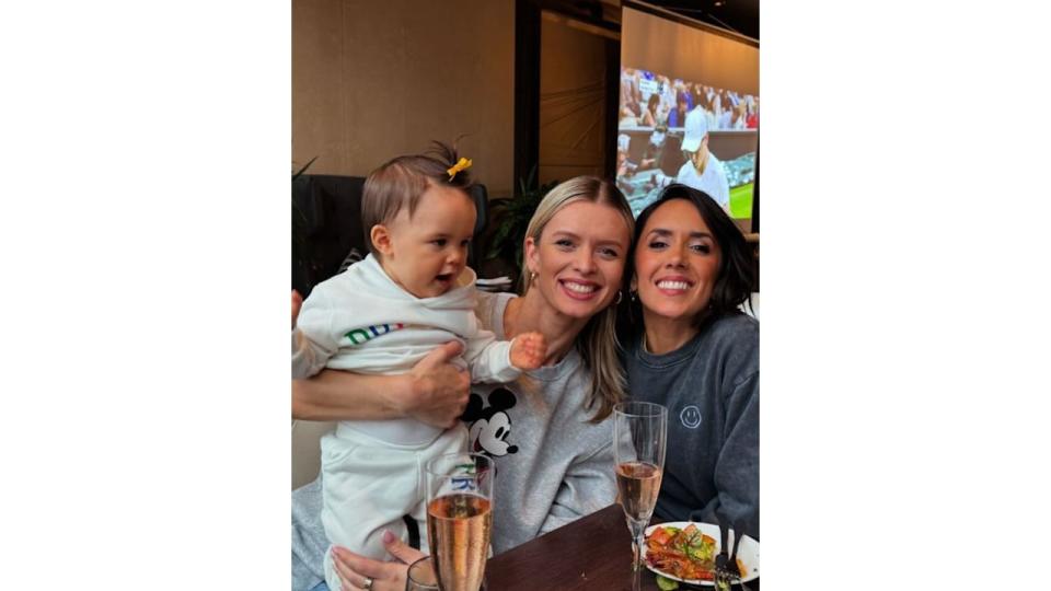 A young girl with Nadiya Bychkova and Janette Manrara