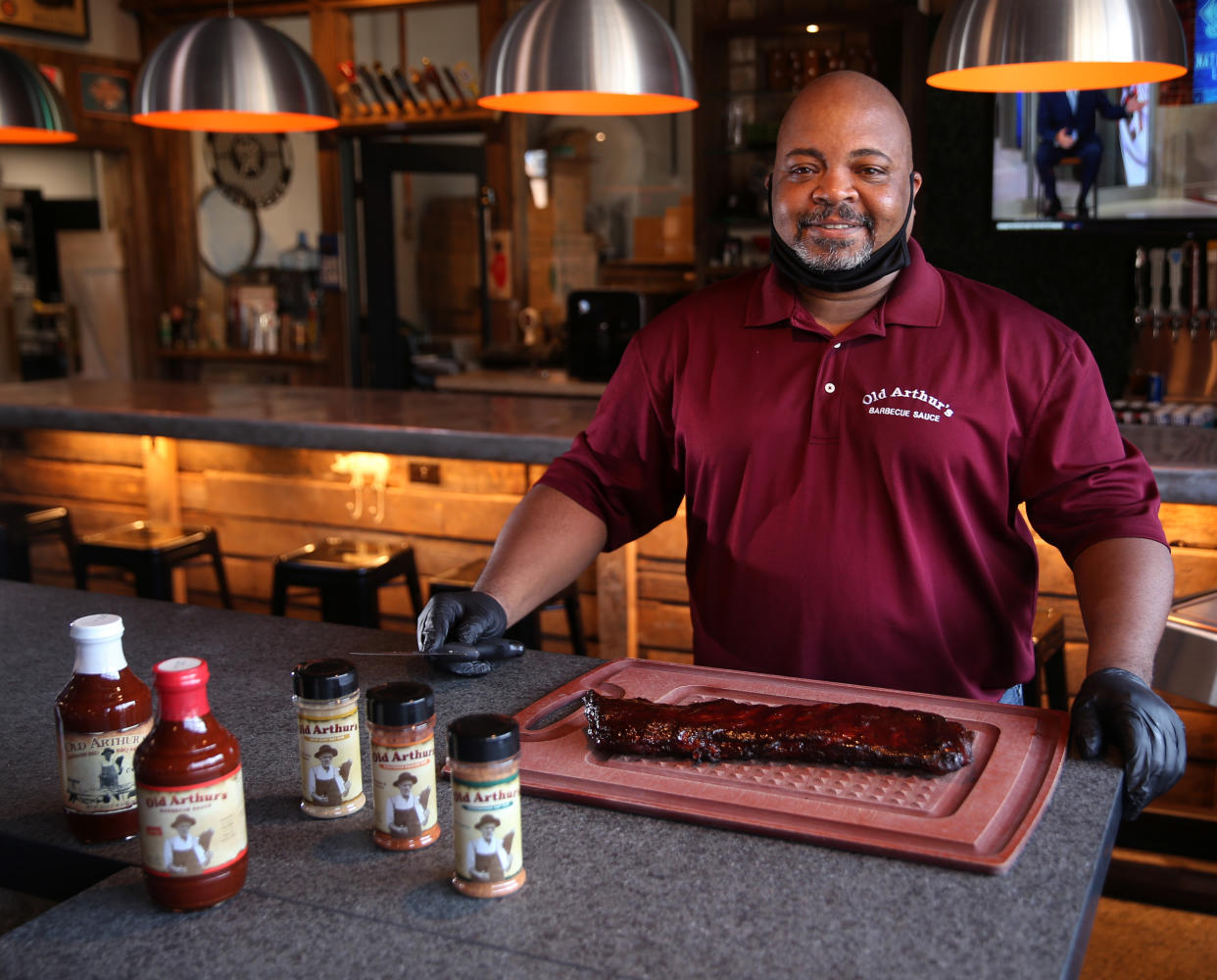 Eudell Watts IV helps carry on his great-great-grandfather's barbecue tradition. (Photo: Old Arthur's)