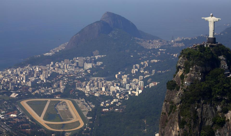 Tourists visit the Christ the Redeemer statue in Rio de Janeiro February 26, 2015. (Reuters)