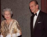 <p>For Queen Elizabeth and Prince Philip's golden wedding anniversary celebration in November 1997, she chose an all gold ensemble and accessories. <br></p>