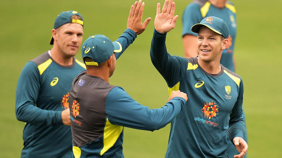 Aaron Finch, Usman Khawaja and Tim Paine during an Australian nets session. (Photo by Daniel Kalisz/Getty Images)