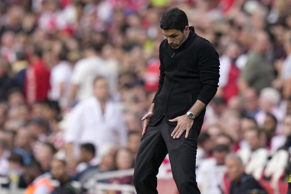 Arsenal's manager Mikel Arteta reacts during the English Premier League soccer match between Arsenal and Everton at the Emirates stadium in London, Sunday, May 19, 2024. (AP Photo/Alastair Grant)