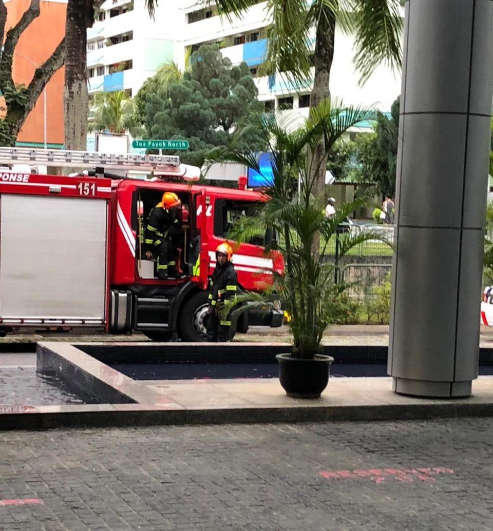 SCDF personnel seen at the driveway of the SPH building on 2 November, 2018. (PHOTO: Yahoo News Singapore reader)
