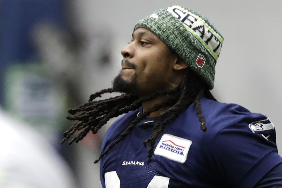 Seattle Seahawks running back Marshawn Lynch jogs as he warms up for NFL football practice, Friday, Dec. 27, 2019, in Renton, Wash. (AP Photo/Ted S. Warren)
