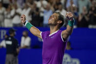 Spain's Rafael Nadal celebrates after defeating Britain's Cameron Norrie in the final match at the Mexican Open tennis tournament in Acapulco, Mexico, Saturday, Feb. 26, 2022. (AP Photo/Eduardo Verdugo)