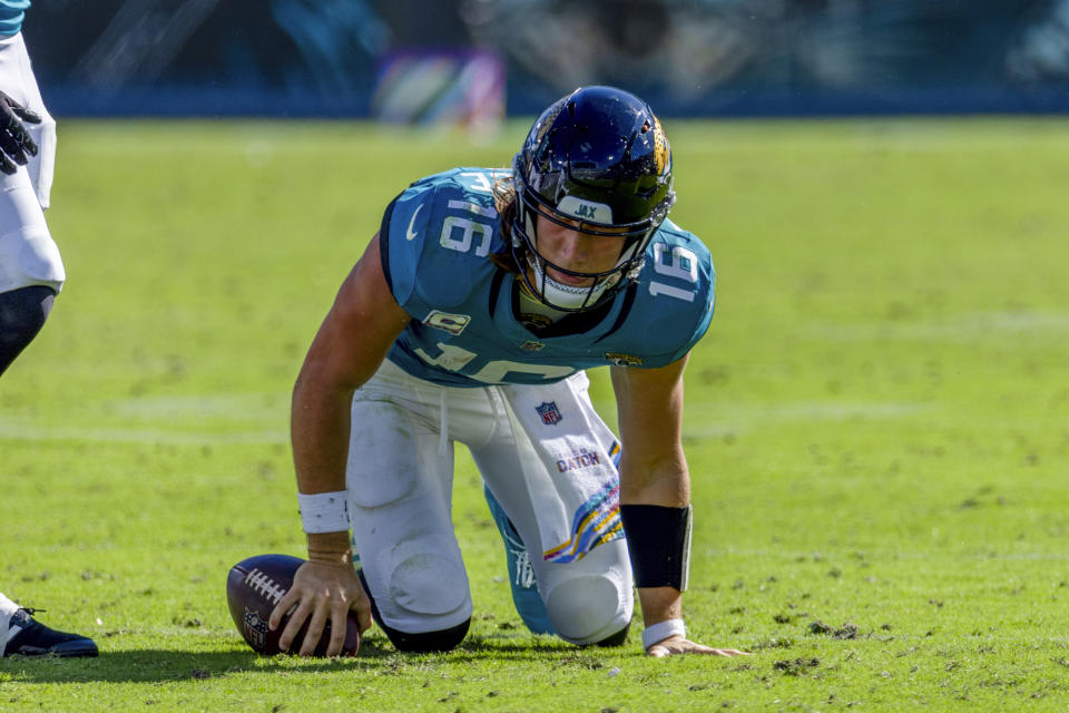 Jacksonville Jaguars quarterback Trevor Lawrence (16) injures his knee during the fourth quarter against the Colts. (AP Photo/Alex Menendez)