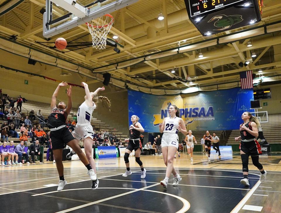 Waterloo's Jazzmyn Lewis (4) drives to the basket in the girls Class B state semifinal game against Cortland at Hudson Valley Community College in Troy, on Friday, March 17, 2023.