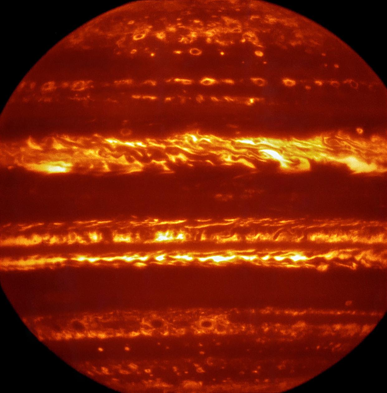 In preparation for the imminent arrival of NASAâ€™s Juno spacecraft in July 2016, astronomers used ESOâ€™s Very Large Telescope to obtain spectacular new infrared images of Jupiter using the VISIR instrument. They are part of a campaign to create high-resolution maps of the giant planet to inform the work to be undertaken by Juno over the following months, helping astronomers to better understand the gas giant. This false-colour image was created by selecting and combining the best images obtained from many short VISIR exposures at a wavelength of 5 micrometres.