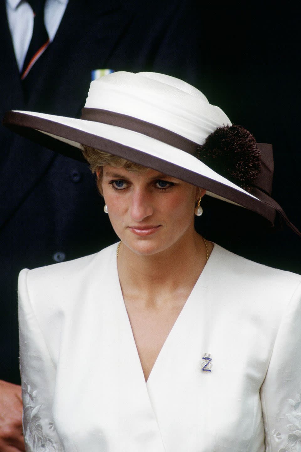 <p>Wearing a brown-and-white hat designed by Marina Killery at an event in London. </p>