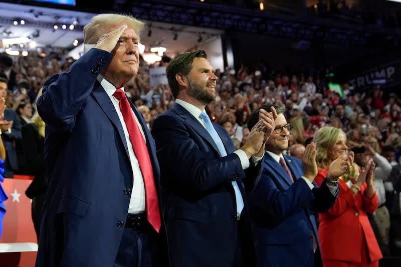 Republican presidential candidate former President Donald Trump and Republican vice presidential candidate Sen. JD Vance, R-Ohio, attend the first day of the Republican National Convention, Monday, July 15, 2024, in Milwaukee. | Evan Vucci