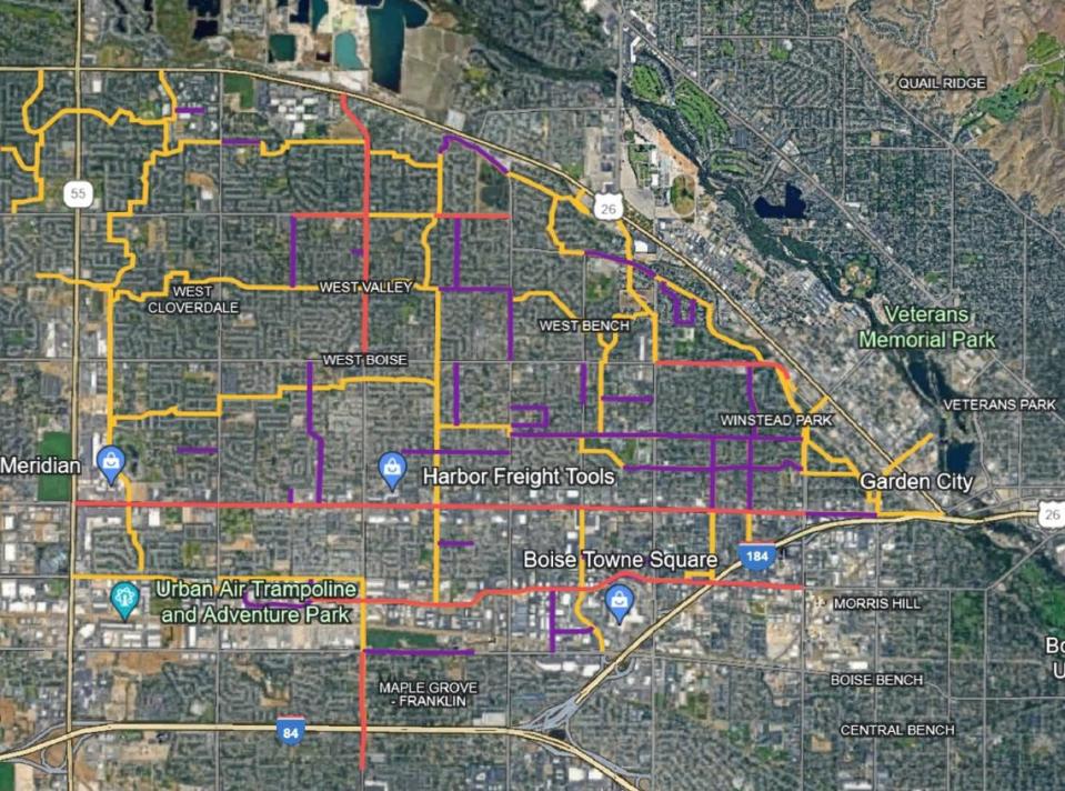 Recommended bicycle improvements are outlined in yellow in this map of the Boise West Bench area while pedestrian improvements are in purple and roadway improvements in red.