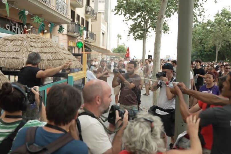 A bar owner is targeted by angry Spanish locals who want tourism to be massively curbed