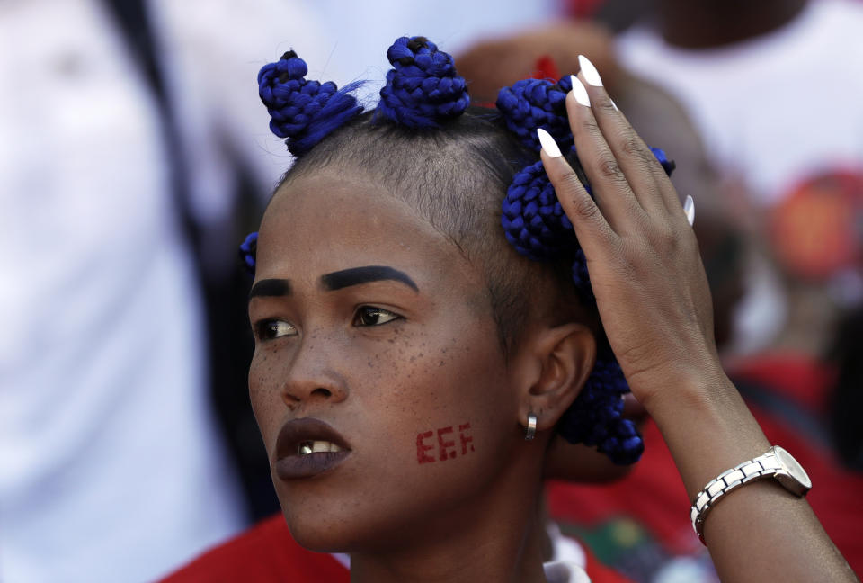 A supporter of the Economic Freedom Fighters (EFF) party, attends an election rally at Orlando Stadium in Soweto, South Africa, Sunday, May 5, 2019. Campaign rallies for South Africa’s upcoming election have reached a climax Sunday with mass rallies by the ruling party and one of its most potent challengers. (AP Photo/Themba Hadebe)
